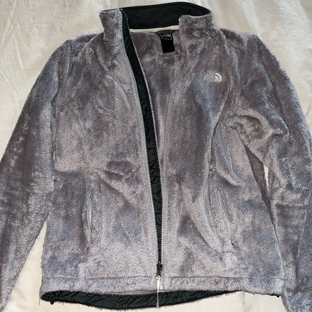 Grey fuzzy north face jacket